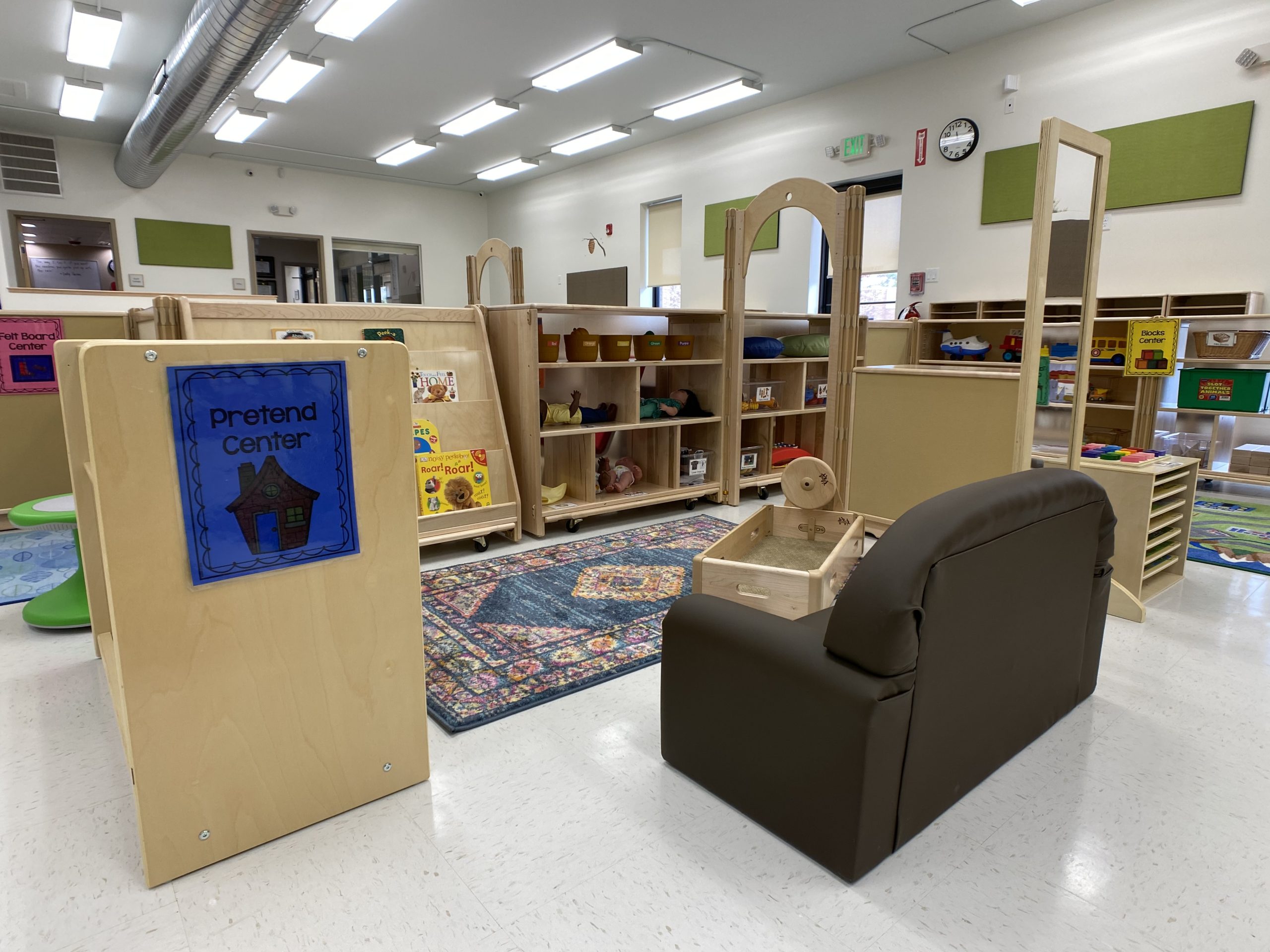 children's learning area - toy and book area with couch